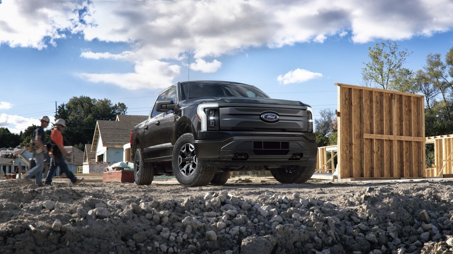 A black 2022 F-150 Lightning Pro at a worksite