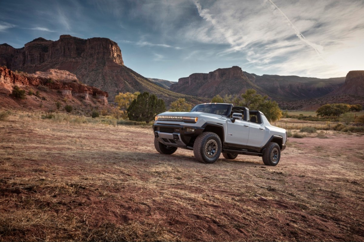 A white Hummer EV in the desert