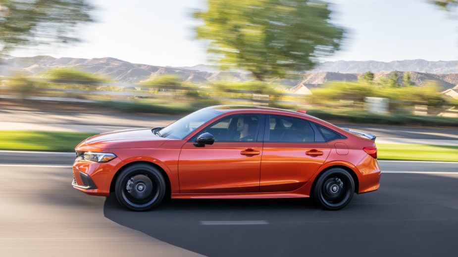 a burnt orange 2022 honda civic si, a great car that uses a great four cylinder engine