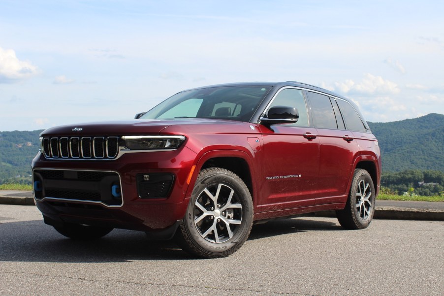 2022 Jeep Grand Cherokee 4xe parked in front of mountains