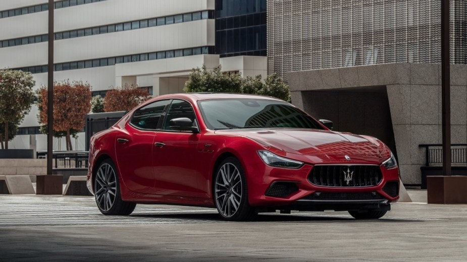 a red 2022 maserati ghibli, a stunning luxury sedan and one of the best new italian cars