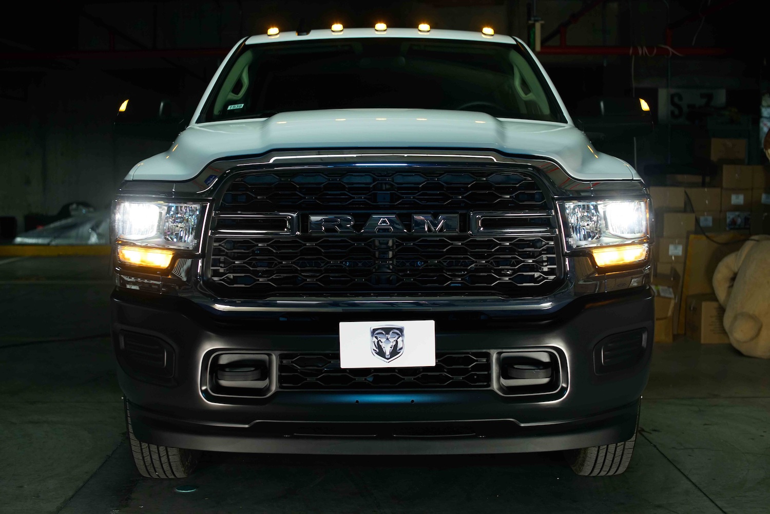 Ram 4000 heavy-duty pickup truck with yellow clearance marker lights on its roof and corners.