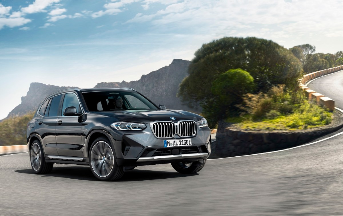 A gray BMW X3 on a twisty road. The X3 is one of the best small luxury SUVs on the market.