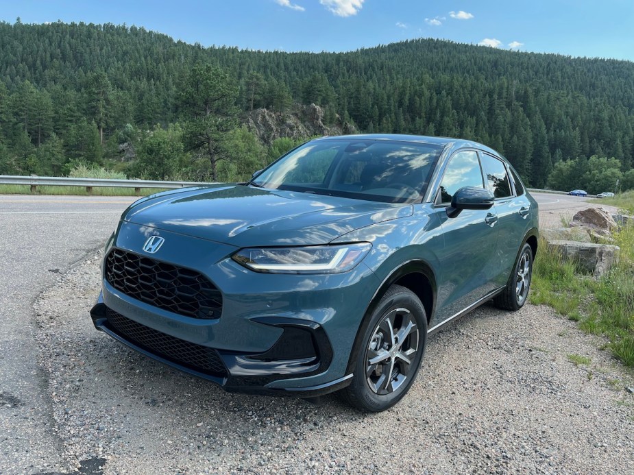 The 2023 Honda HR-V sitting next to a canyon road.