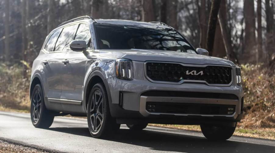 The 2023 Kia Telluride driving down the road.