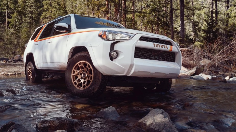 A white 2023 Toyota 4Runner with retro stripes.