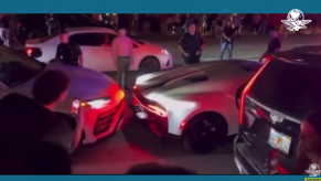 Bad Bunny's Bugatti Chiron outside of his new restaurant after getting hit