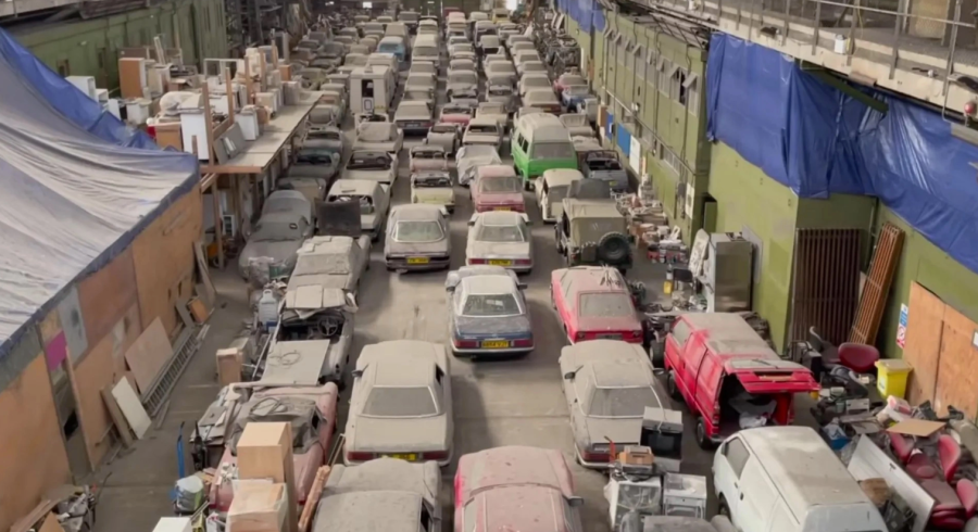 dozens out dusty vintage cars. Barn find heaven.