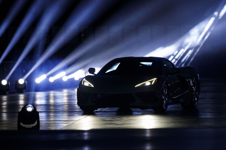 The C8 Corvette, like this one cast in shadow, is quick enough to outrun a Mustang GT.