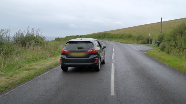 View Optical Illusion Road Where Cars in Neutral Roll Uphill