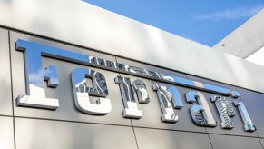 Ferrari written on the side of a building, as Ferrari Claims to Limit Autonomy to Preserve the 'Emotion' of the Car.