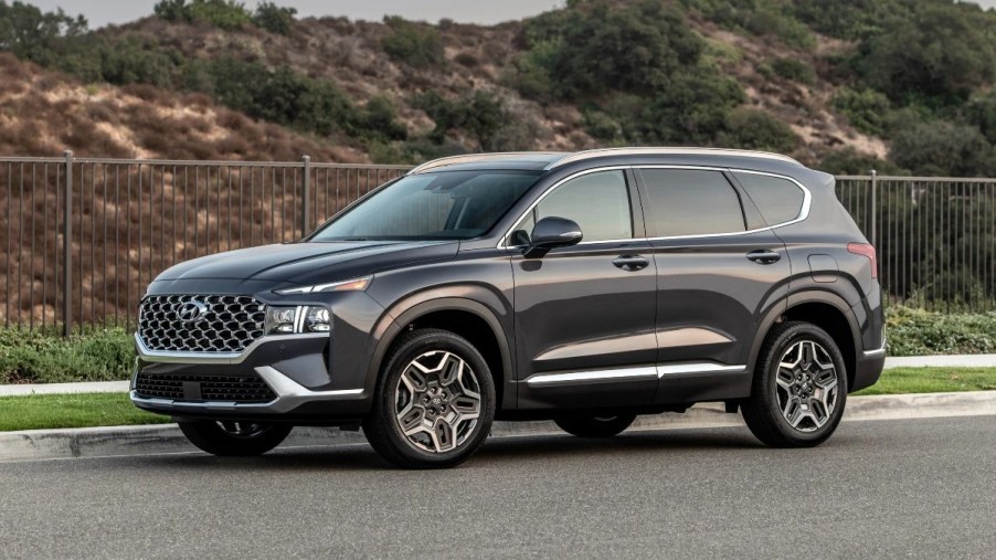 Front angle view of Portofino Gray 2023 Hyundai Santa Fe crossover SUV