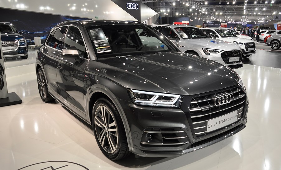 a gray Audi Q5 55 at an auto show.