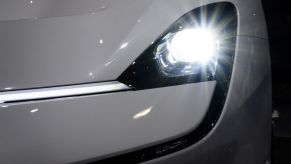 Daylight running lights on a white car.