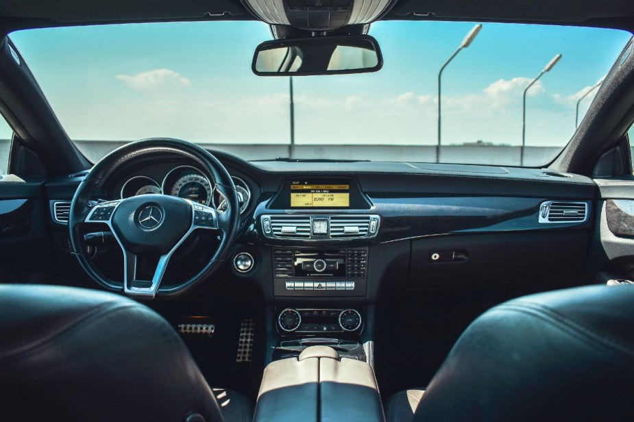 Interior of Mercedes-Benz, highlighting why the driver's seat is either on the left or right side of car