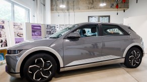 A grey Ioniq 5 parked indoors.