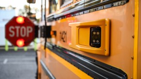 School bus with it's stop sign out.