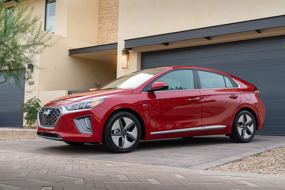 A red 2022 Hyundai Ioniq Hybrid on a driveway