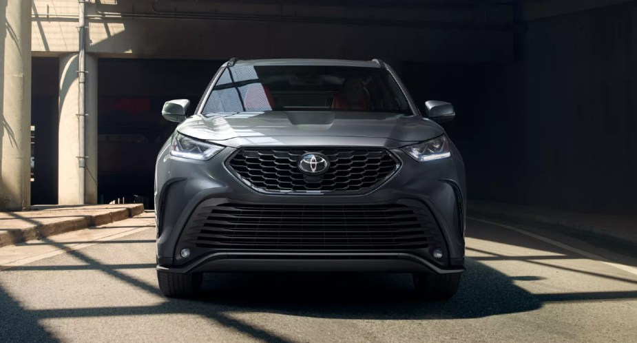 A gray 2022 Toyota Highlander midsize SUV is parked. 