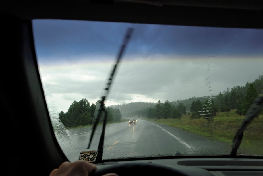 A set of windshield wipers are smearing instead of wiping the windshield 