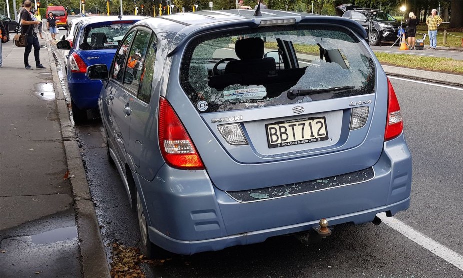 A car with shattered windows. 