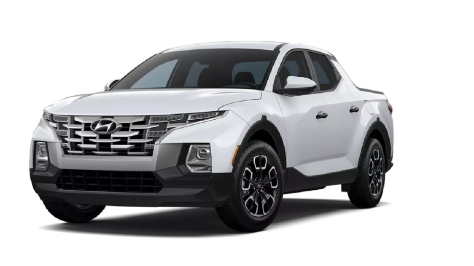 A white 2022 Hyundai Santa Cruz against a white background. 