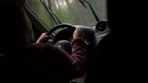 Windshield wipers operating during rain for a driver in Warsaw, Poland