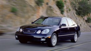 A front view of the 2002 Lexus GS driving on a canyon road.