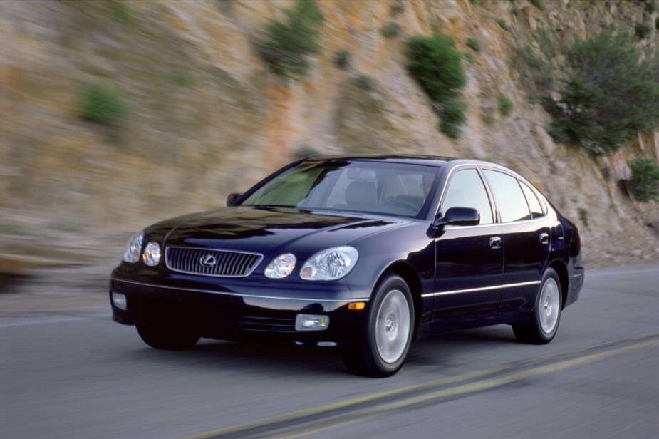 A front view of the 2002 Lexus GS driving on a canyon road.