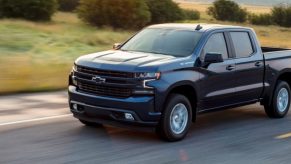 a black 2021 Chevy Silverado in black on a road