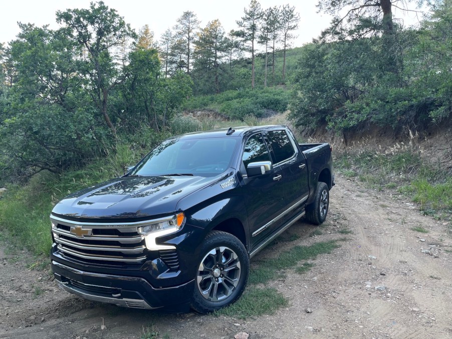 A front view of the 2022 Silverado driving down a hill.