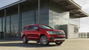 2022 Ford Expedition in red parked outside. There's 1 reason the Platinum trim is worth the upgrade.