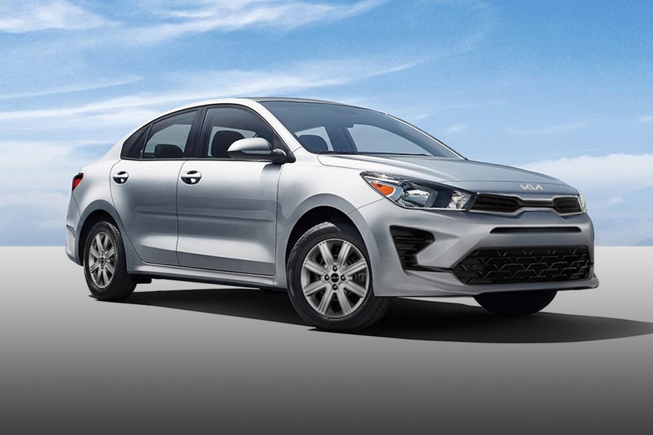 The Kia Rio is nearly identical to Hyundai's little compact sedan.