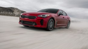 The Kia Stinger GT2 is a fast sports sedan. However, how fast is the Kia Stinger compared to other sharp sedans?