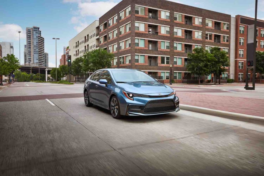 A light blue 2022 Toyota Corolla parked