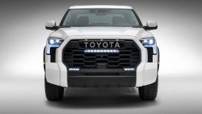 Promo photo of a Toyota Tundra TRD Pro hybrid pickup truck in white, against a white background.