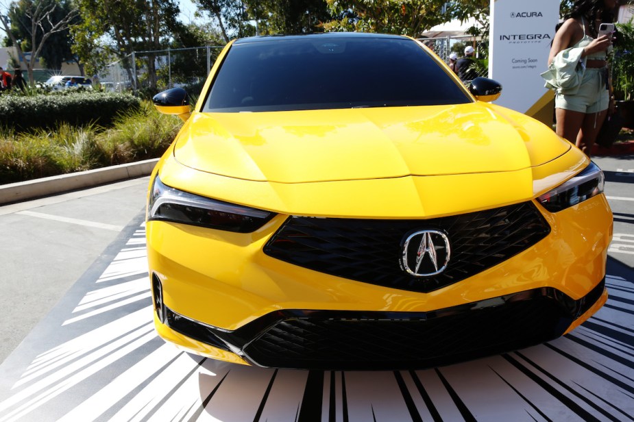 A yellow 2023 Acura Integra, an example of a liftback. 