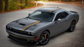 A silver 2023 Dodge Challenger parked outdoors.