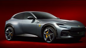 A gray 2023 Ferrari Purosangue luxury sports SUV.