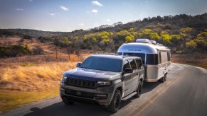 2023 Jeep Wagoneer L towing a camper