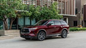 2023 Infiniti QX60 in maroon on a street