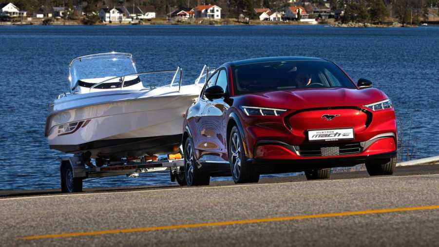 2023 Ford Mustang Mach-E towing a boat