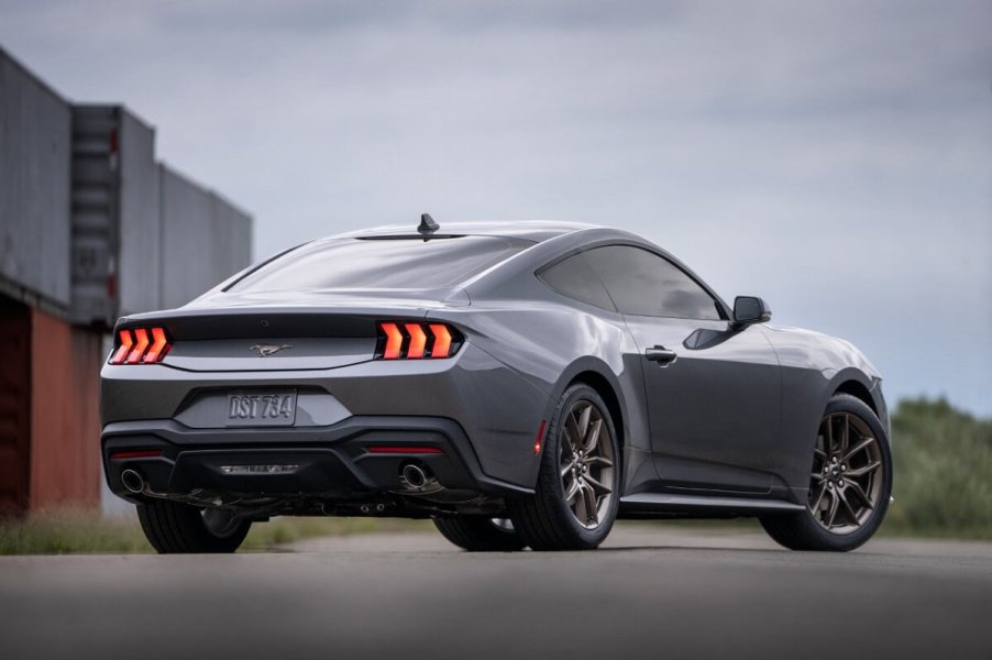 A gray 2024 Ford Mustang EcoBoost parks in a harbor.