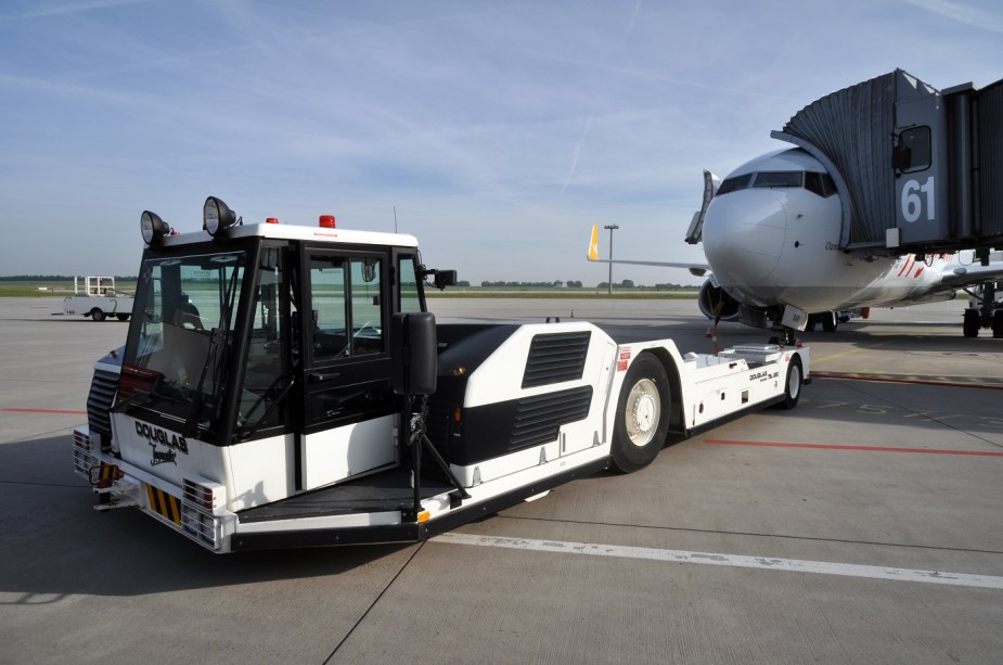 A Douglas aircraft tug at an airport