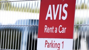 A sign from Avis regarding their drop-offs.