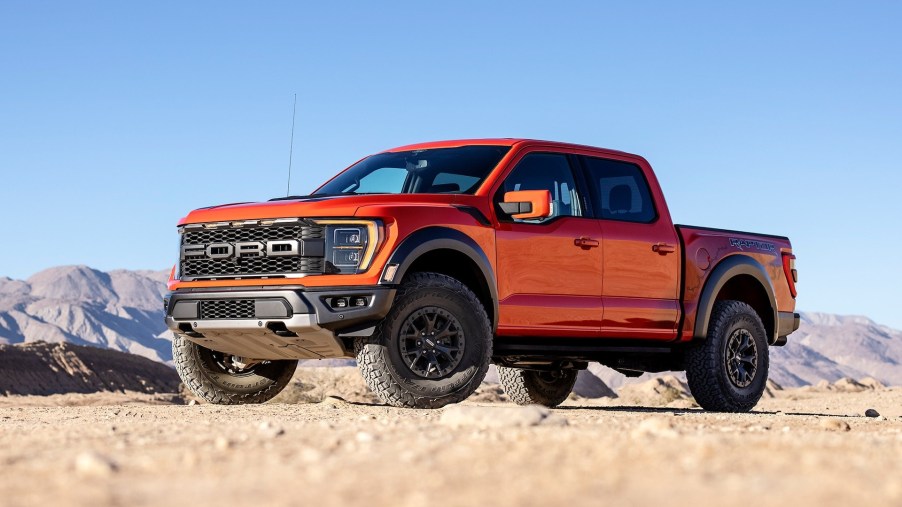 Orange Ford F-150 Raptor Posed in the desert