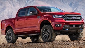 A red 2022 Ford Ranger small pickup truck is parked outdoors.