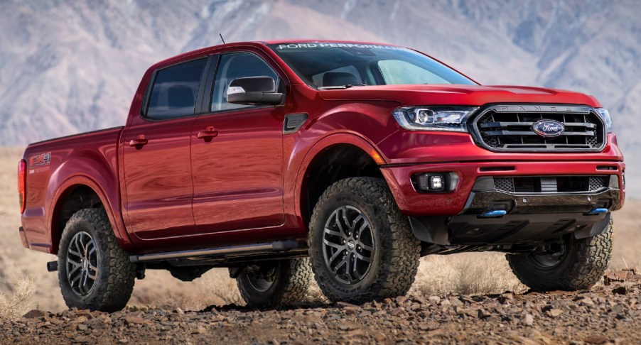 A red 2022 Ford Ranger small pickup truck is parked outdoors.