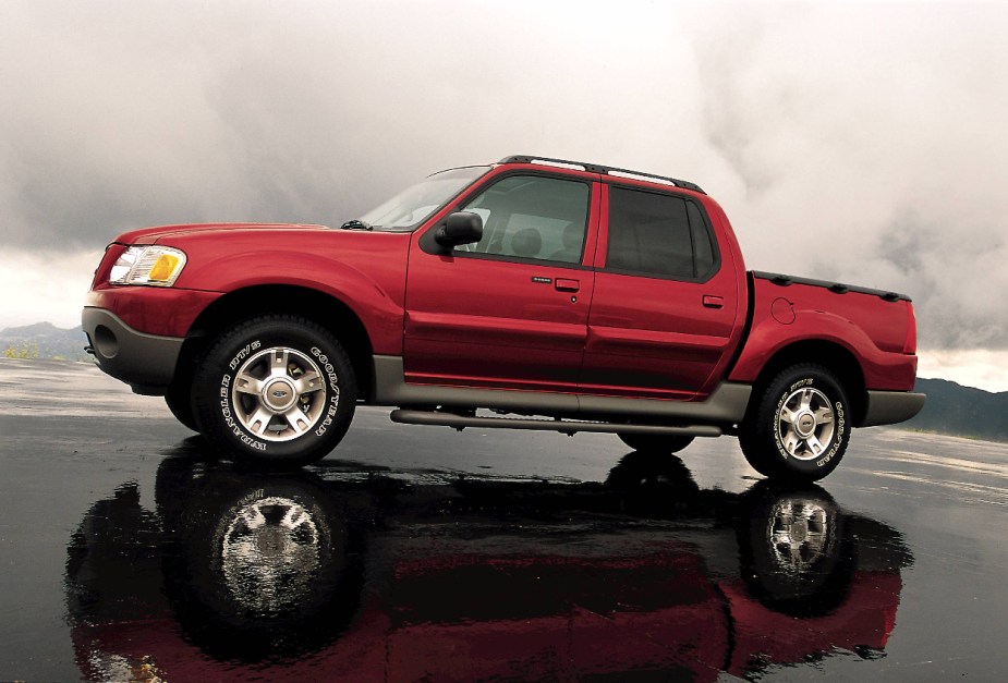 A red Ford Explorer Sport Trac shows off as a mid-size truck.