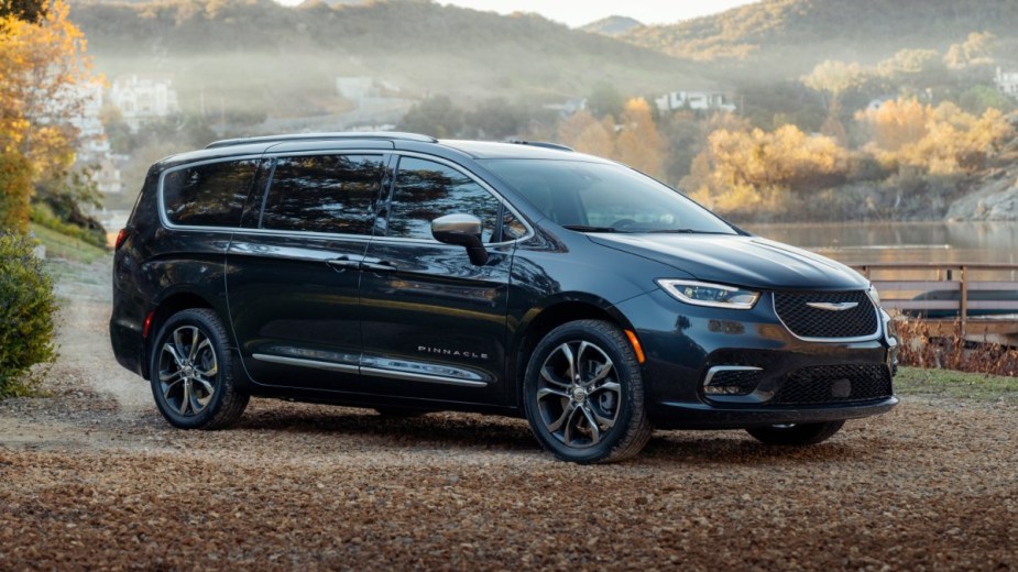 Front angle view of Brilliant Black 2023 Chrysler Pacifica minivan